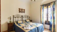 Posteľ alebo postele v izbe v ubytovaní La Casa de Isabel Villaviciosa de Córdoba by Ruralidays
