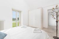 Posteľ alebo postele v izbe v ubytovaní Villa Trullina by Raro Villas
