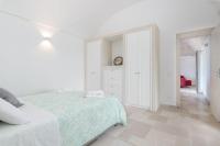 Posteľ alebo postele v izbe v ubytovaní Villa Trullina by Raro Villas