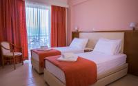 Postel nebo postele na pokoji v ubytování Palatino Hotel