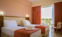 Postel nebo postele na pokoji v ubytování Palatino Hotel