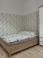 Posteľ alebo postele v izbe v ubytovaní Apartament Rydygiera