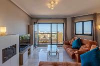 Televízia a/alebo spoločenská miestnosť v ubytovaní 797 HOLIDAY RENTALS - Moderno Piso para 5 con hermosas vistas