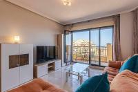 Televízia a/alebo spoločenská miestnosť v ubytovaní 797 HOLIDAY RENTALS - Moderno Piso para 5 con hermosas vistas