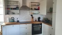 Kuchnia lub aneks kuchenny w obiekcie Appartement cosy en cœur de bourg