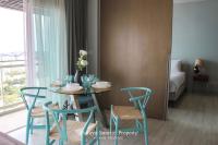 Postel nebo postele na pokoji v ubytování Veranda Residences Pattaya By Phung