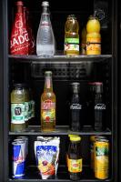 a refrigerator filled with lots of different types of drinks at Luxury Collection &amp; Resort in Cormeilles-en-Parisis