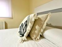 Postel nebo postele na pokoji v ubytování Housing León La Imprenta