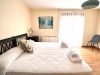 Postel nebo postele na pokoji v ubytování Housing León La Imprenta