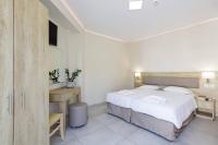 Posteľ alebo postele v izbe v ubytovaní Theo Star Beach Hotel