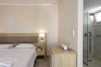 Posteľ alebo postele v izbe v ubytovaní Theo Star Beach Hotel
