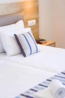 Posteľ alebo postele v izbe v ubytovaní Theo Star Beach Hotel