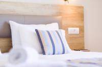 Posteľ alebo postele v izbe v ubytovaní Theo Star Beach Hotel