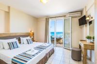 Posteľ alebo postele v izbe v ubytovaní Theo Star Beach Hotel