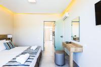 Posteľ alebo postele v izbe v ubytovaní Theo Star Beach Hotel