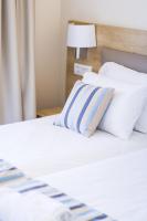 Posteľ alebo postele v izbe v ubytovaní Theo Star Beach Hotel