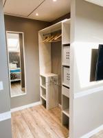 Televízia a/alebo spoločenská miestnosť v ubytovaní Duplex cosy - entre lacs et montagnes - Fêtes interdites