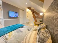 Posteľ alebo postele v izbe v ubytovaní Duplex cosy - entre lacs et montagnes - Fêtes interdites