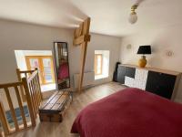 Posteľ alebo postele v izbe v ubytovaní Petite Maison Cosy - Sérent Centre