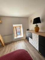 Posteľ alebo postele v izbe v ubytovaní Petite Maison Cosy - Sérent Centre