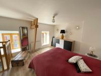 Posteľ alebo postele v izbe v ubytovaní Petite Maison Cosy - Sérent Centre