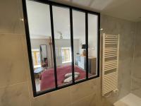 Kúpeľňa v ubytovaní Petite Maison Cosy - Sérent Centre