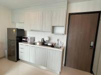 Kuchyň nebo kuchyňský kout v ubytování The prio apartment chiangmai airport