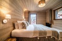 Posteľ alebo postele v izbe v ubytovaní Apartment Cervino Monriond Courchevel - by EMERALD STAY