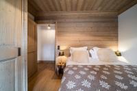 Posteľ alebo postele v izbe v ubytovaní Apartment Cervino Monriond Courchevel - by EMERALD STAY