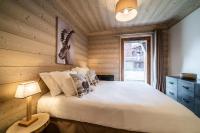 Posteľ alebo postele v izbe v ubytovaní Apartment Cervino Monriond Courchevel - by EMERALD STAY