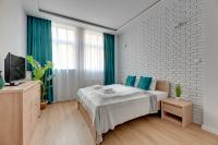 Posteľ alebo postele v izbe v ubytovaní Comfort Apartments Grobla II