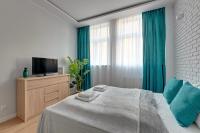 Posteľ alebo postele v izbe v ubytovaní Comfort Apartments Grobla II