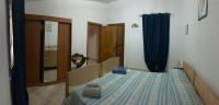 A bed or beds in a room at Casa vacanze Barvis