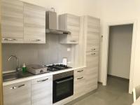A kitchen or kitchenette at Scogliera apartments