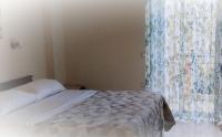 Postel nebo postele na pokoji v ubytování Riza Falasarna Apartments