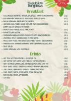 ein Bild einer Speisekarte für ein Restaurant mit Blumen in der Unterkunft Kohrong Sea Views Bungalows in Koh Rong