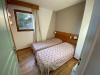 Posteľ alebo postele v izbe v ubytovaní Au Bachat-Bouloud, appartement 3 pièces 6 personnes avec balcon plein Sud