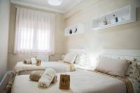 Postel nebo postele na pokoji v ubytování Gallimó Apartaments