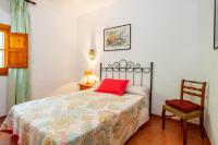 Postel nebo postele na pokoji v ubytování Casa La Encina