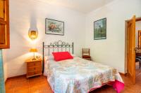 Postel nebo postele na pokoji v ubytování Casa La Encina