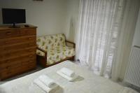Posteľ alebo postele v izbe v ubytovaní Stefanos Apartment