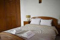 Posteľ alebo postele v izbe v ubytovaní Stefanos Apartment