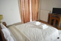 Posteľ alebo postele v izbe v ubytovaní Stefanos Apartment