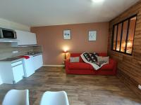 Kuchnia lub aneks kuchenny w obiekcie Fleurs des Alpes