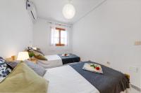 Posteľ alebo postele v izbe v ubytovaní Cozy Apartment near the sea