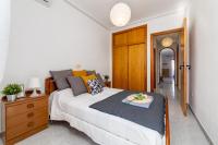 Posteľ alebo postele v izbe v ubytovaní Cozy Apartment near the sea