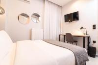 Posteľ alebo postele v izbe v ubytovaní F & B Collection - City Central 2 Bedroom Suite