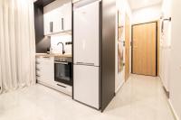 Kuchyňa alebo kuchynka v ubytovaní F & B Collection - City Central 2 Bedroom Suite