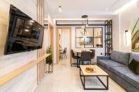 Televízia a/alebo spoločenská miestnosť v ubytovaní F & B Collection - City Central 2 Bedroom Suite