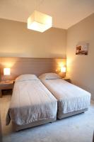 Postel nebo postele na pokoji v ubytování Kalydna Island Hotel